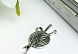 Декор для творчества металл "Клубок пряжи со спицами" серебро 1,2х2,5 см (уп=10шт)